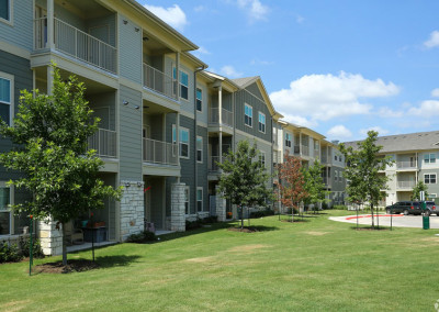 The Villages at Ben White exterior with patios and balconies